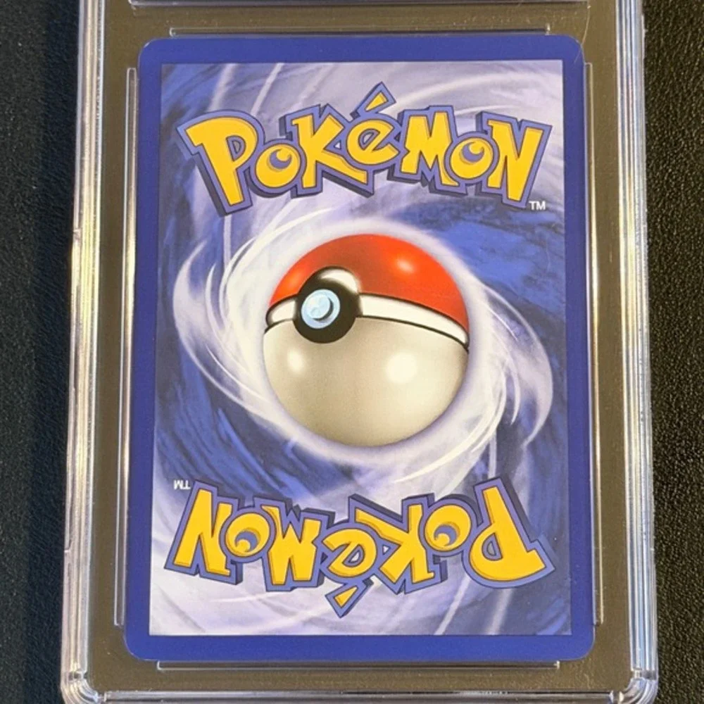 Pokemon Omanyte 1st Edition Fossil 52/62 CGC 8.5 NM/Mint+ TCG 1999 WOTC Vintage